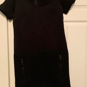 Black dress with quilted bottom trim